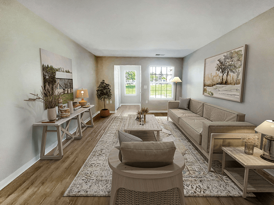 a living room with a couch and a table