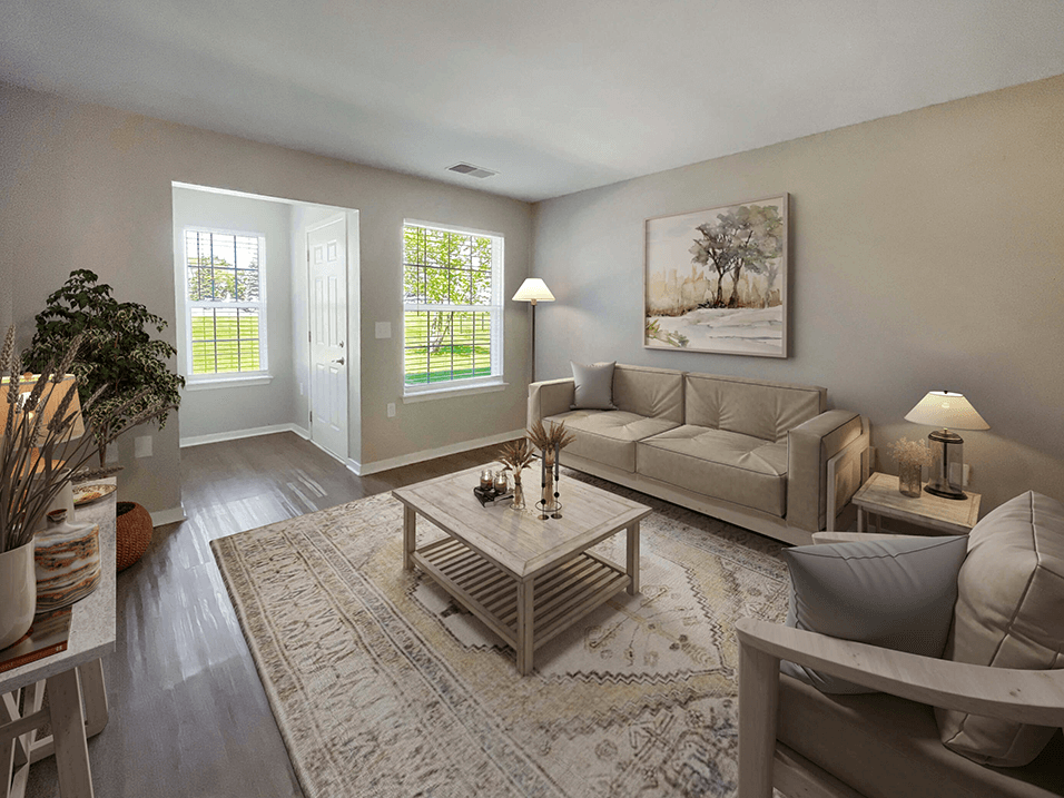 a living room with a couch and a table