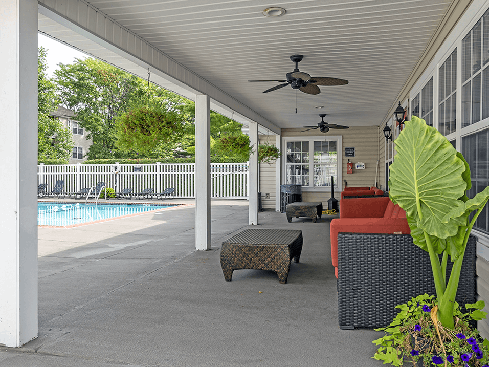 pool with covered patio at apartment community