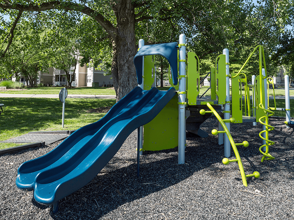 playground with a blue slide