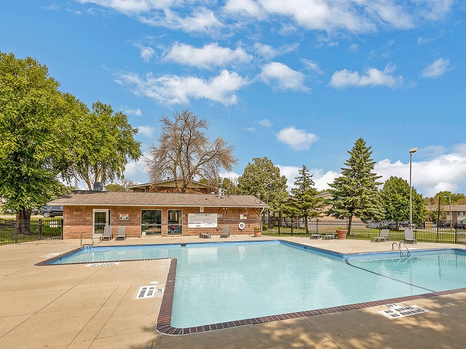 our apartments have a swimming pool and a clubhouse with trees