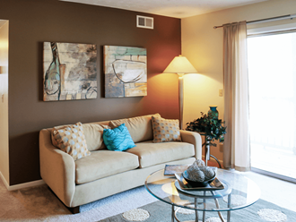 a living room with sliding glass door