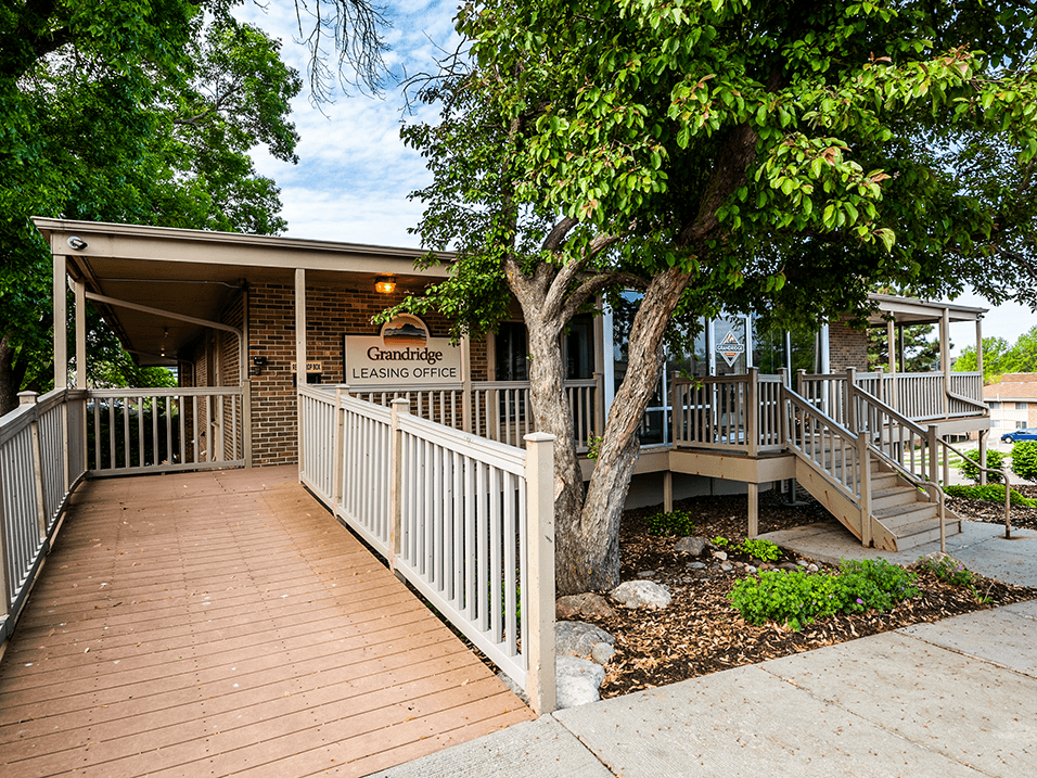 leasing building with a wooden ramp