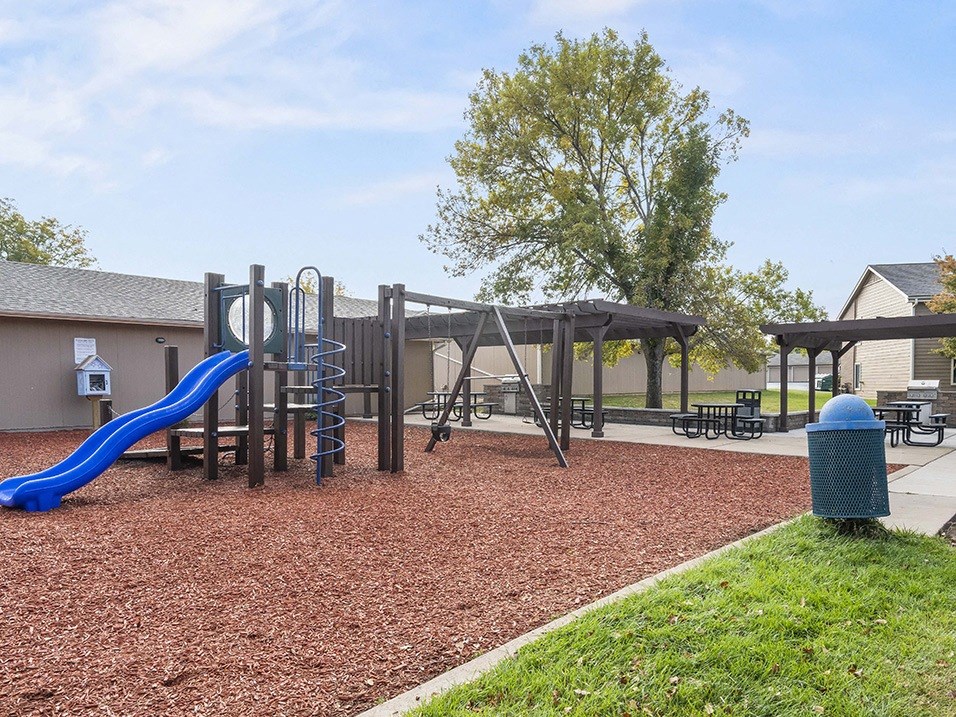 our playground is equipped with a swing set and slide