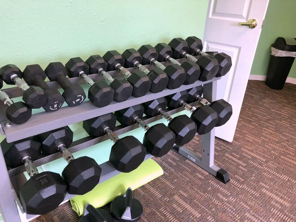 Free weights in Fairfield Apartments gym