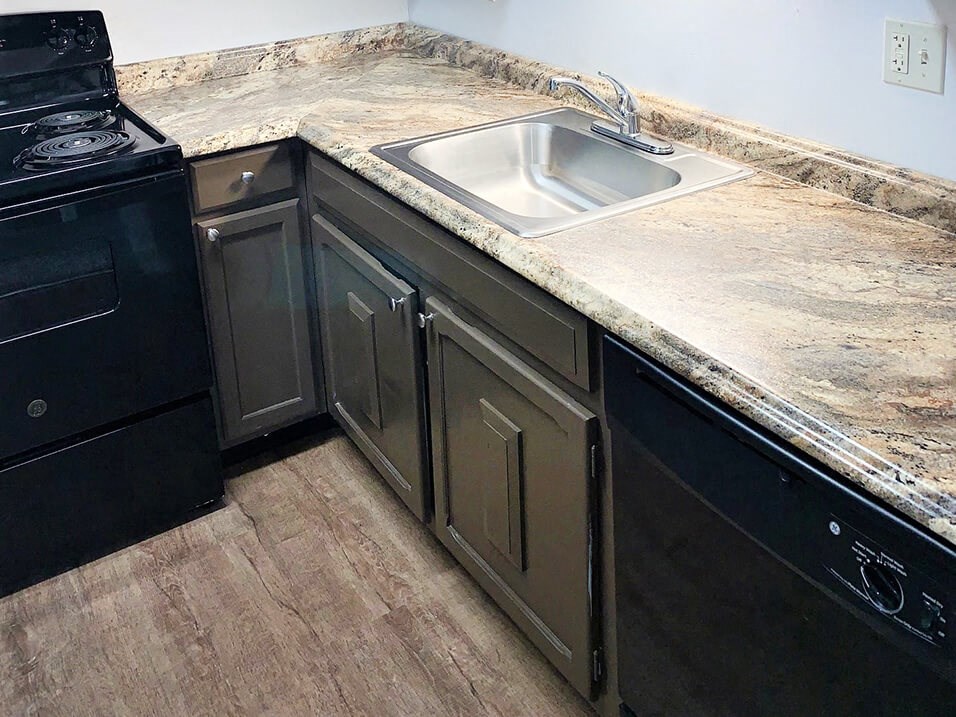 kitchen with dishwasher in Kettering 