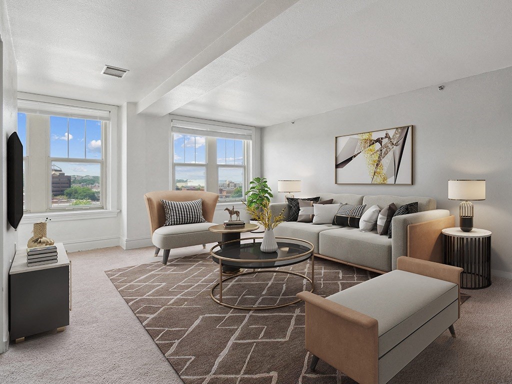 living room of an apartment with carpeting