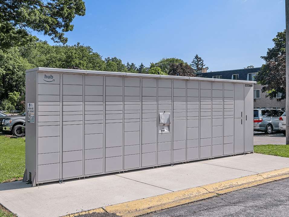 a large metal building with a sign on the side of it