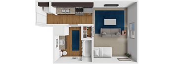A modern living room with a white sofa and a blue accent wall.
