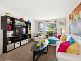 a living room with a couch and a tv