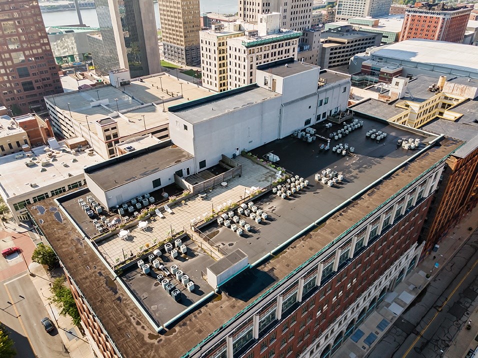 an aerial view of a large building in a city