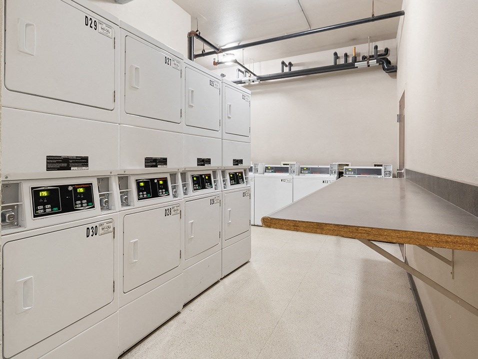 a room filled with white machines and a table