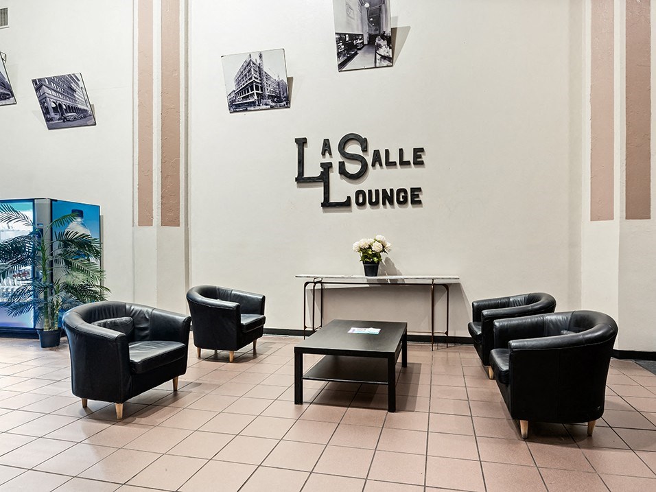 the lobby with chairs and a table