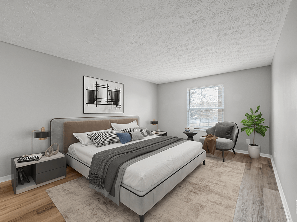 Large bedroom with window and lots of natural light and updated features