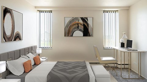 A modern bedroom with a large bed and two art pieces on the wall.