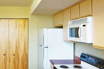 kitchen with microwave in loft