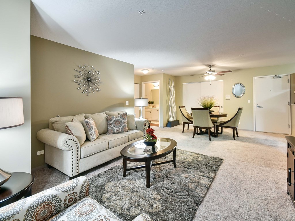 a living room with a couch and a table