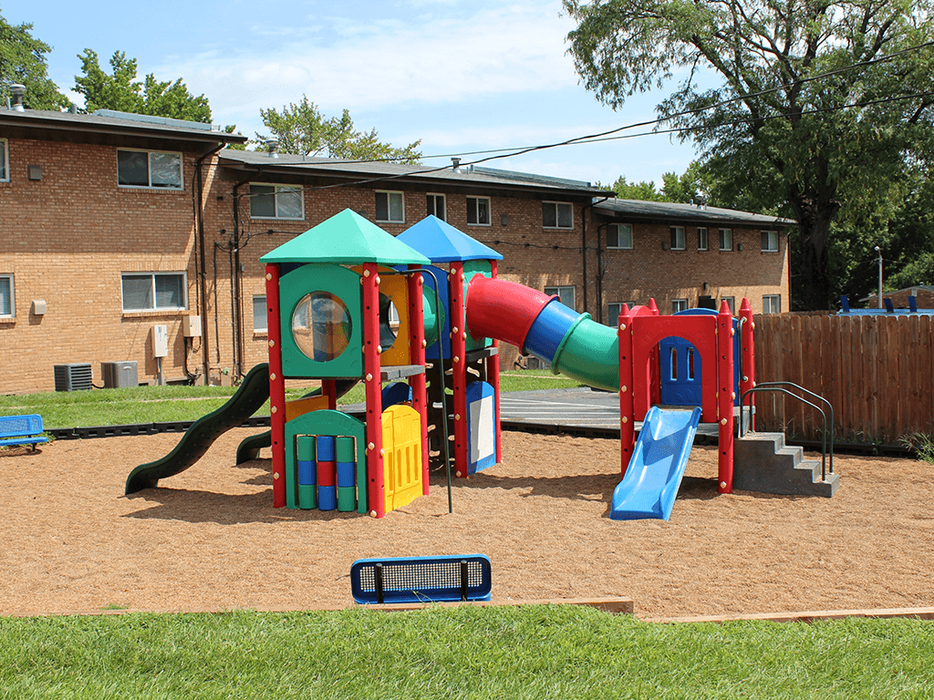 a playground with a slide at Nantucket Gardens Apartments