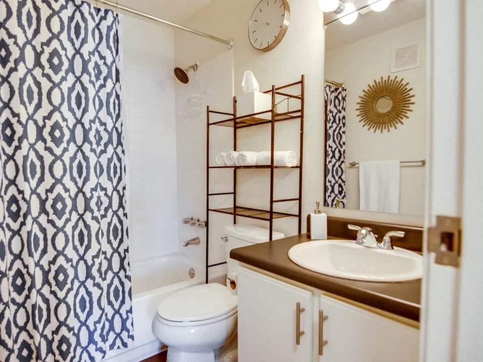 Bathroom with tub at apartment