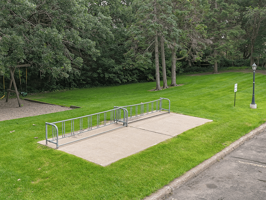 A bike rack at the oak at bentonshire apartments.