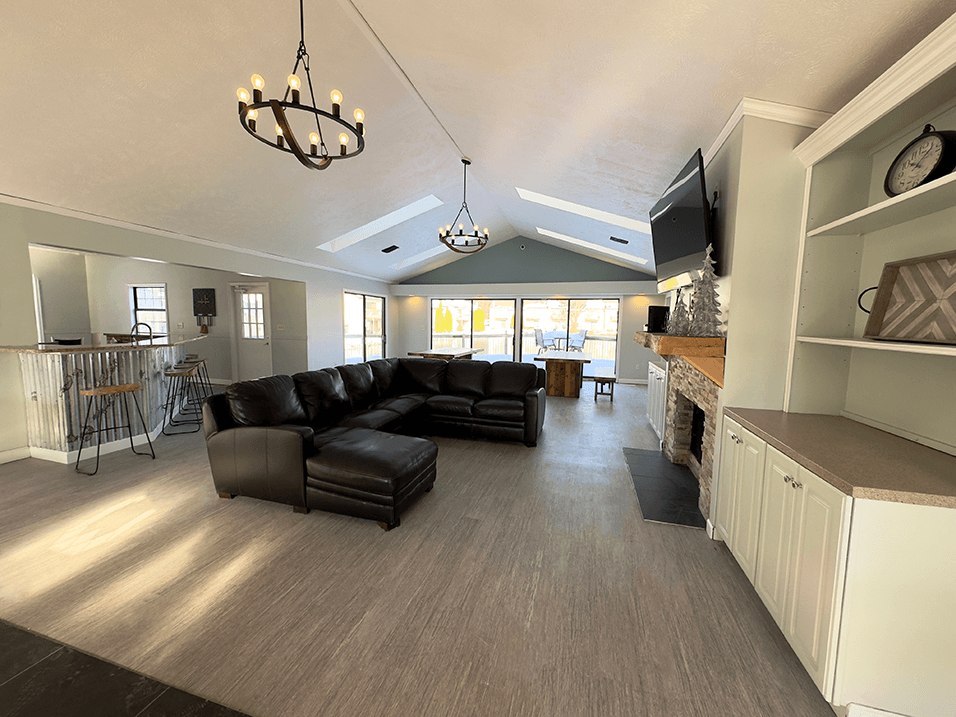 lounge area with sofa and tv at old farm shores apartments