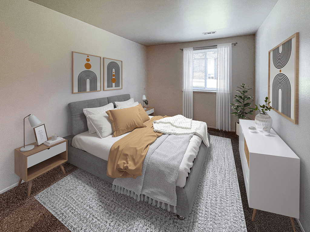 a bedroom with a bed and a dresser