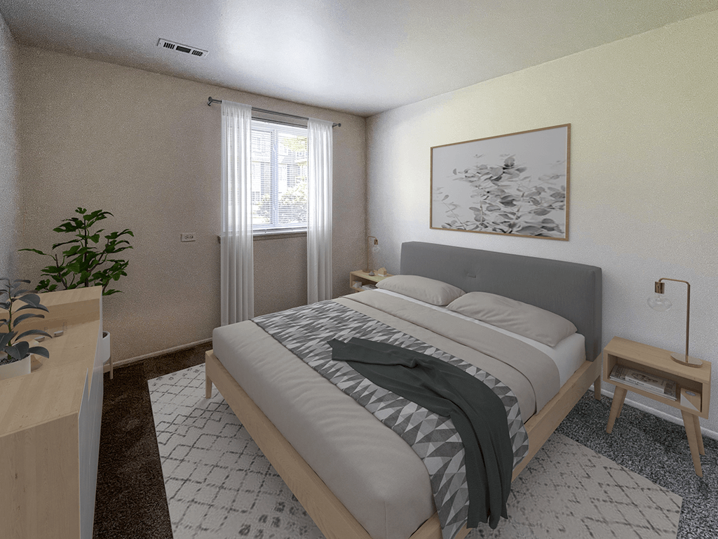 a bedroom with a bed and a dresser and a window