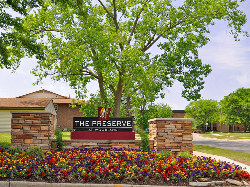 sign outside preserve at woodland apartment - Photo Gallery 1