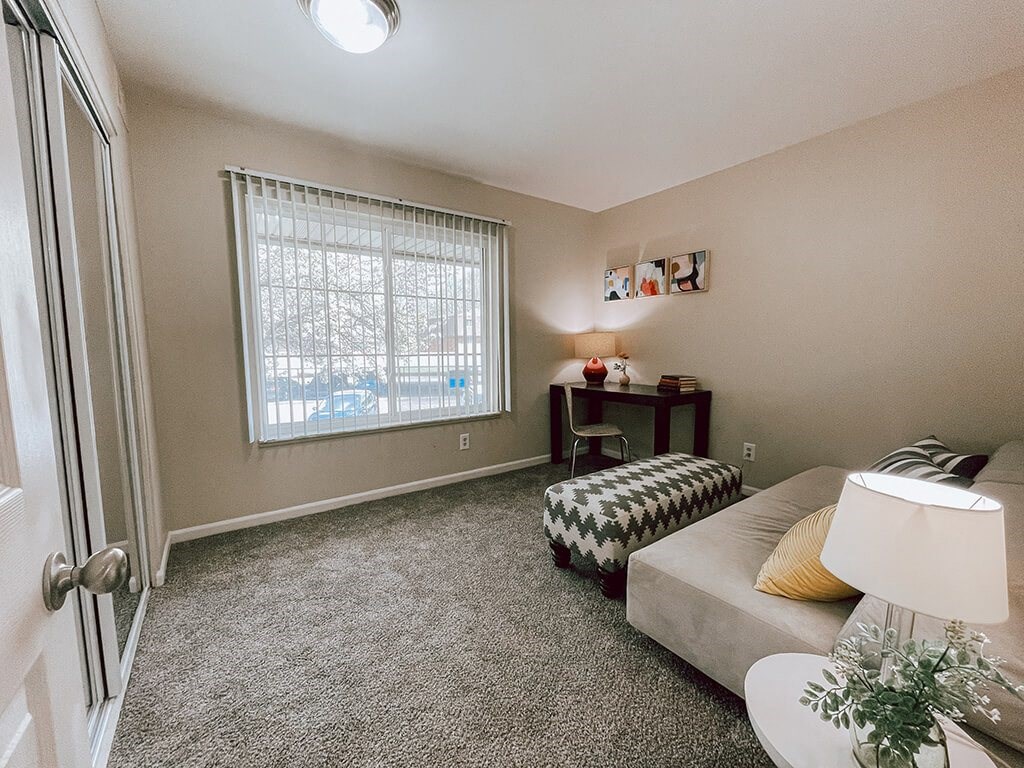 a bedroom with and a window