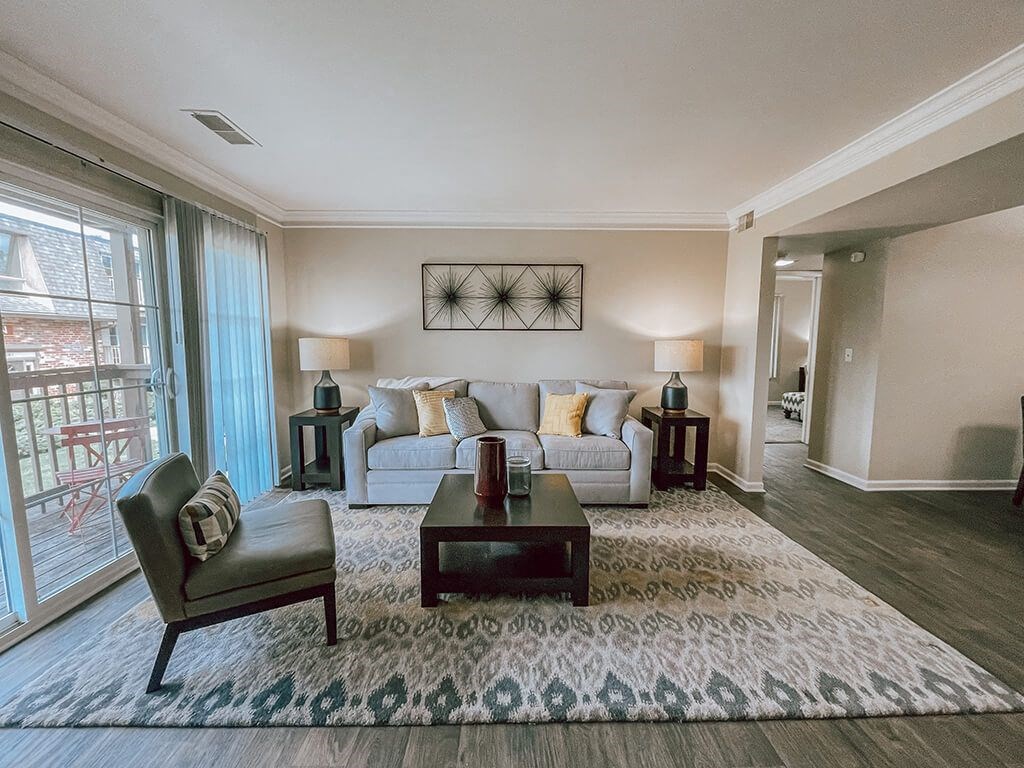 a living room with a couch and a table