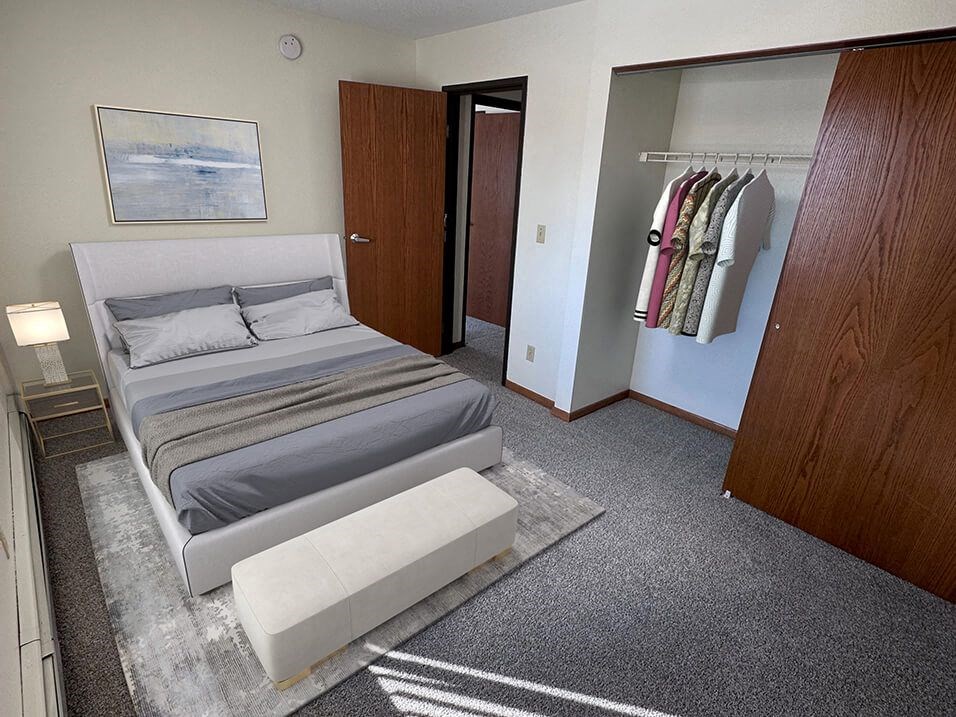 a bedroom with a bed and a closet