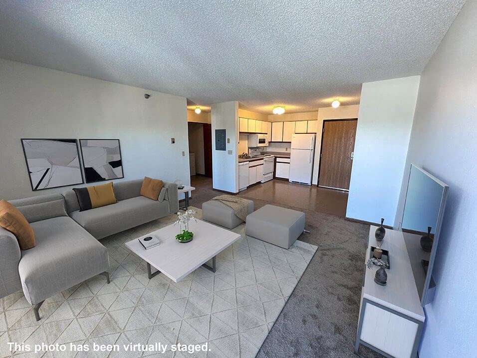 a view of the living room and kitchen from the balcony