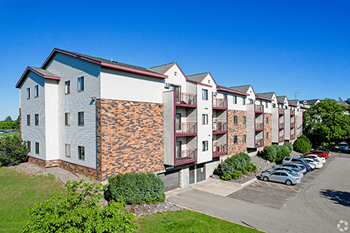 apartment building exterior at pointe west apartments 