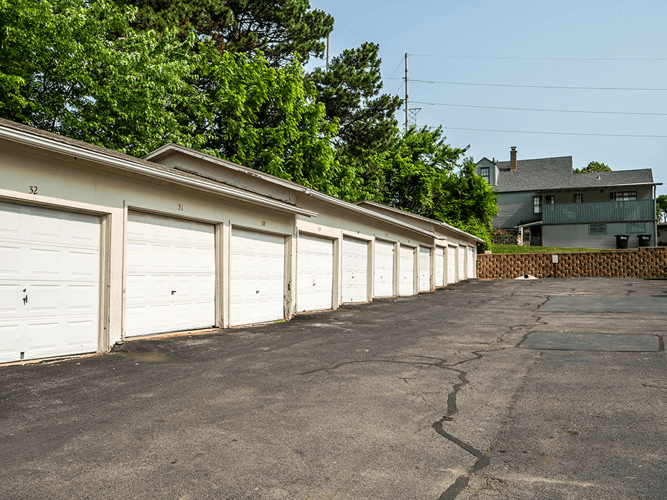 a row of garages in front of a building