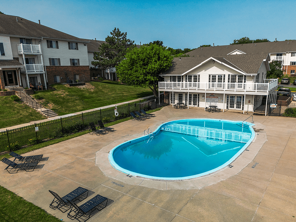 take a dip in the pool at Pacific Winds Apartments