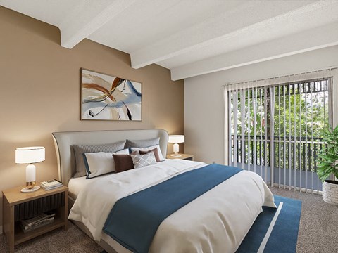 spacious bedroom with large windows