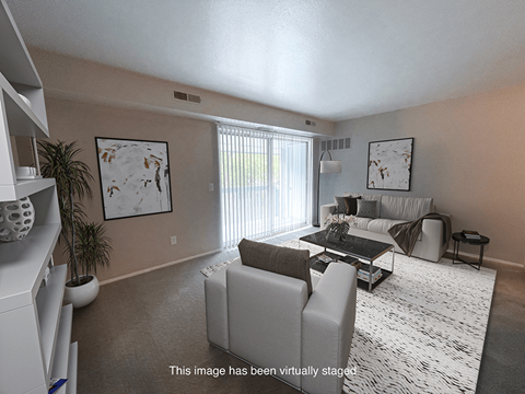 an image of a living room with white furniture and a white rug