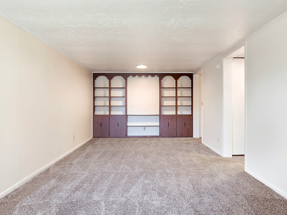 living room with a carpeted floor