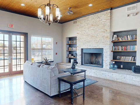 A living room with a fireplace and a couch.
