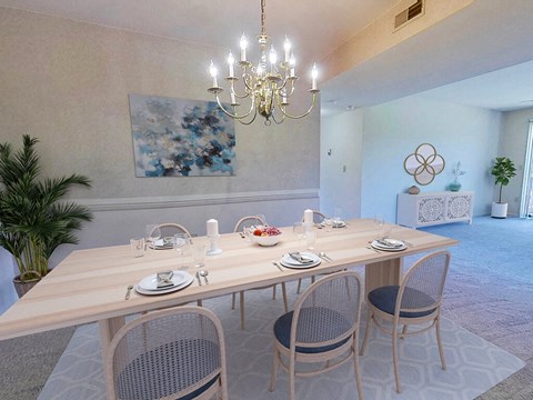 A dining room with a wooden table set for four.