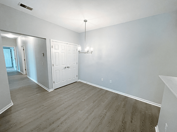 modern and open apartment dining room at shoreline landing apartments - Photo Gallery 2