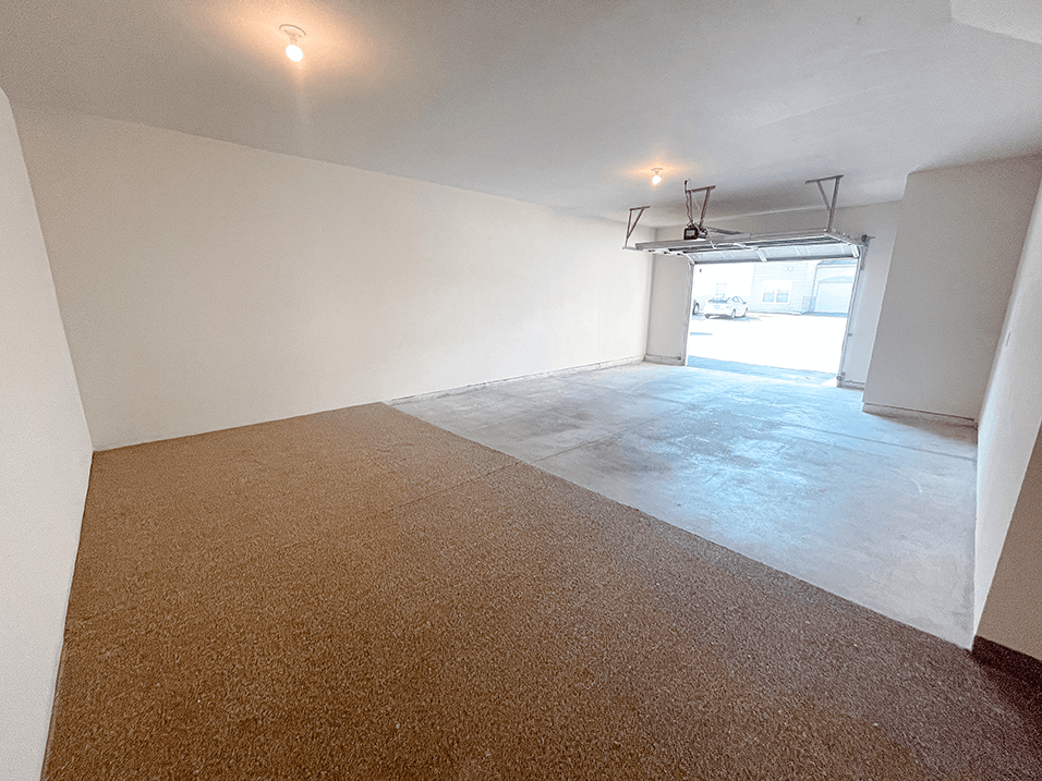 Spacious attached garage at shoreline landing apartment in norton shores