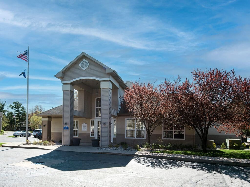 a building with an flag in front of it