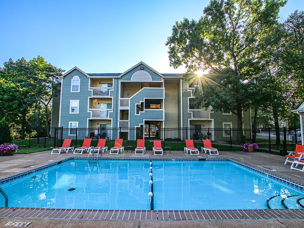 outdoor swimming pool with at an apartment building