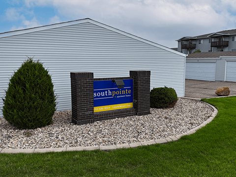 A sign for Southpointe is in front of a building.