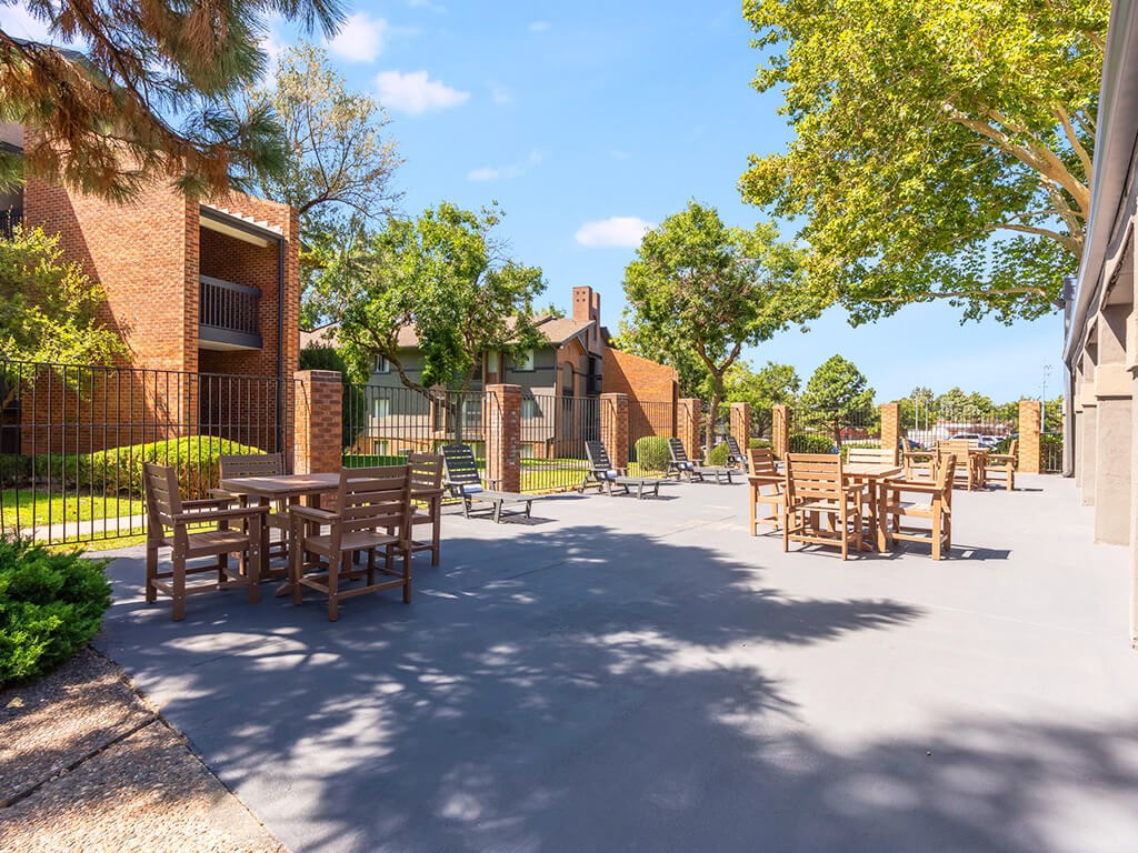 A sunny day at the outdoor seating area of a restaurant.