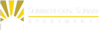 a green and yellow house with a yellow and white logo