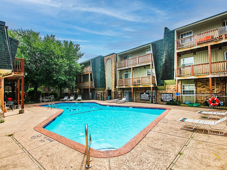 a resort style pool at apartment building