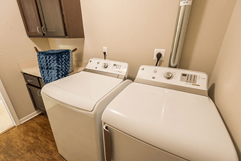 Washer and dryer in apartment at Silver Lake Hills in Fenton, MI