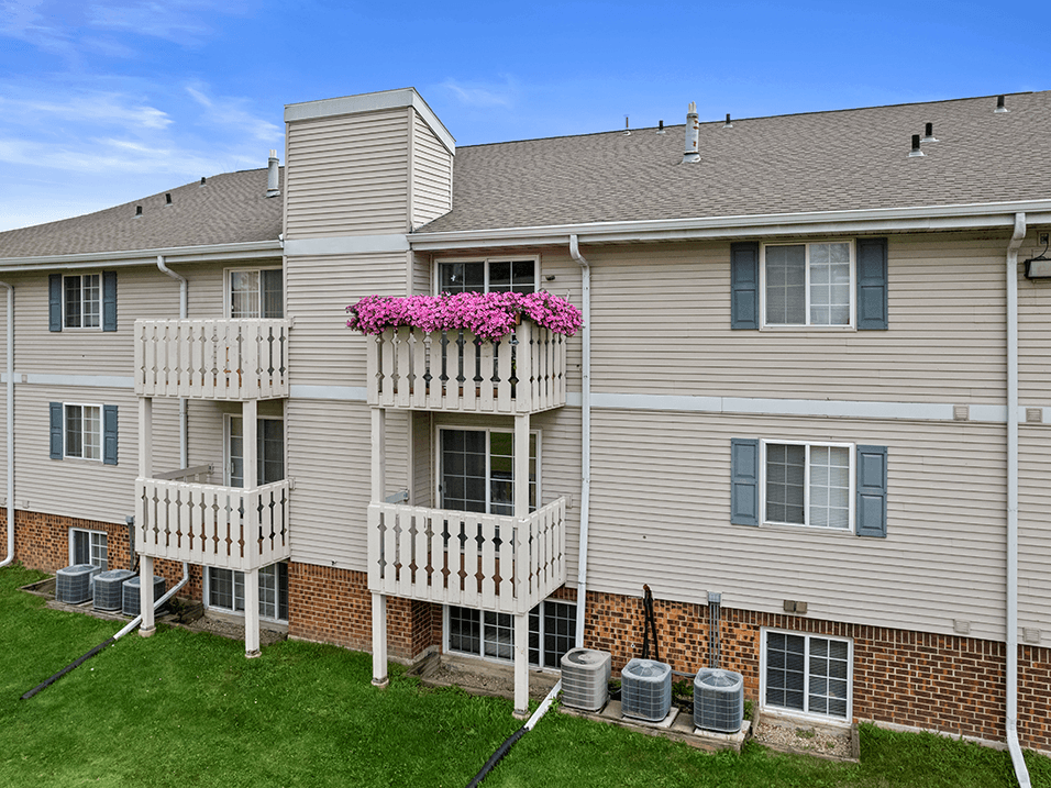 an apartment building with Bavarian inspired balconies outside sun valley apartments